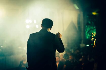 comedian performing on stage